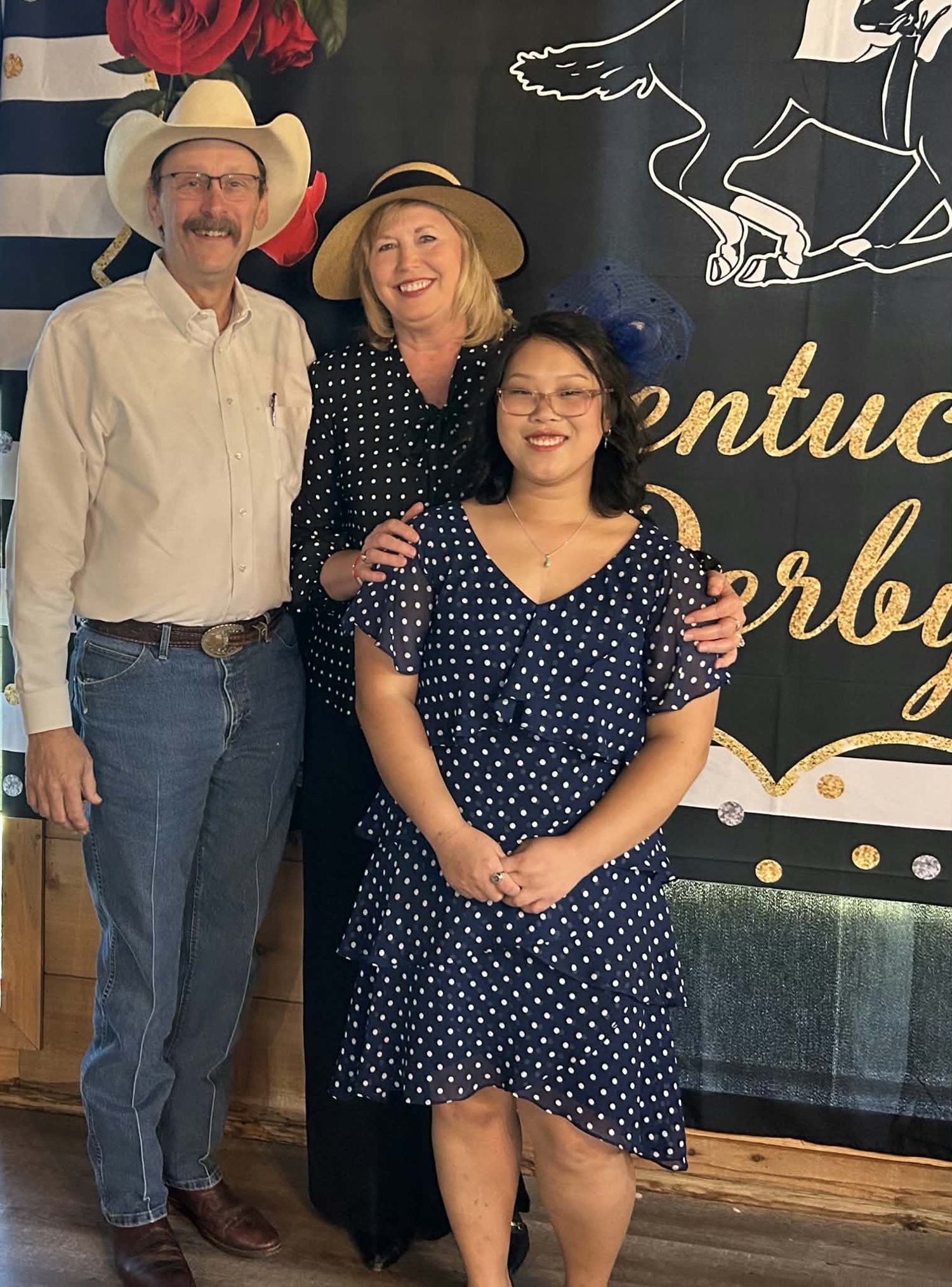 Adam King with his wife and daughter at a community event