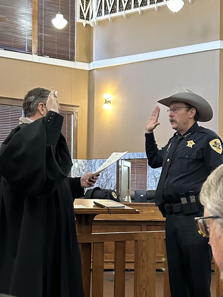 Sheriff Adam King being sworn into office